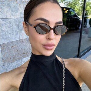 Miu Miu MU04ZSF VAU07F Sunglasses Honey Havana Oval Frame